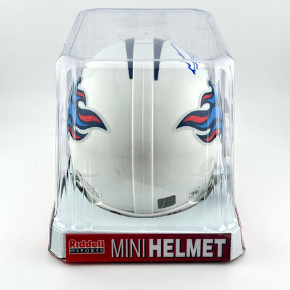 Riddell sports mini football helmet with Tennessee Titans logo in packaging on a white background