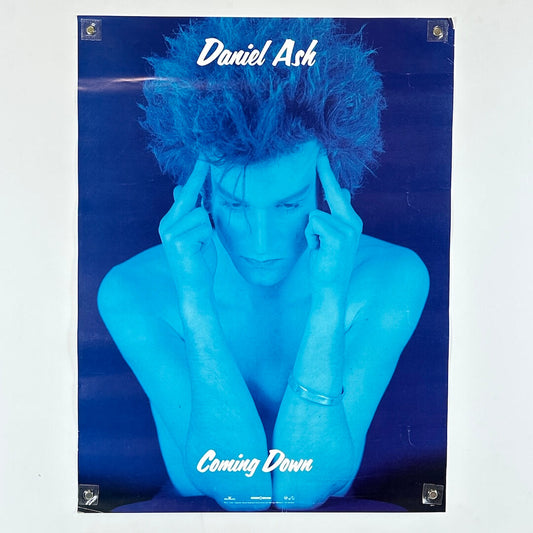 Album cover with a person in blue tones and 'Daniel Ash Coming Down' text.