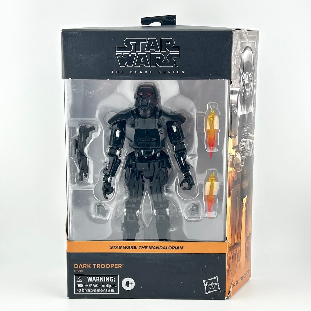 Star Wars The Black Series Dark Trooper action figure in original window box packaging, featuring the black armored figure.