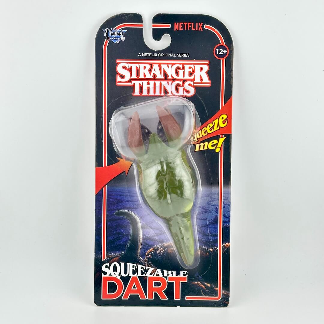 Stranger Things squeezeable dart toy in its original Netflix blister card packaging.