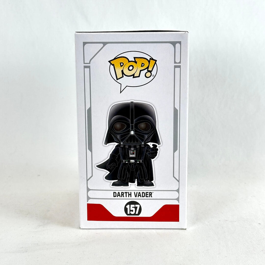 Funko Pop! Darth Vader vinyl figure in its original white window box packaging.
