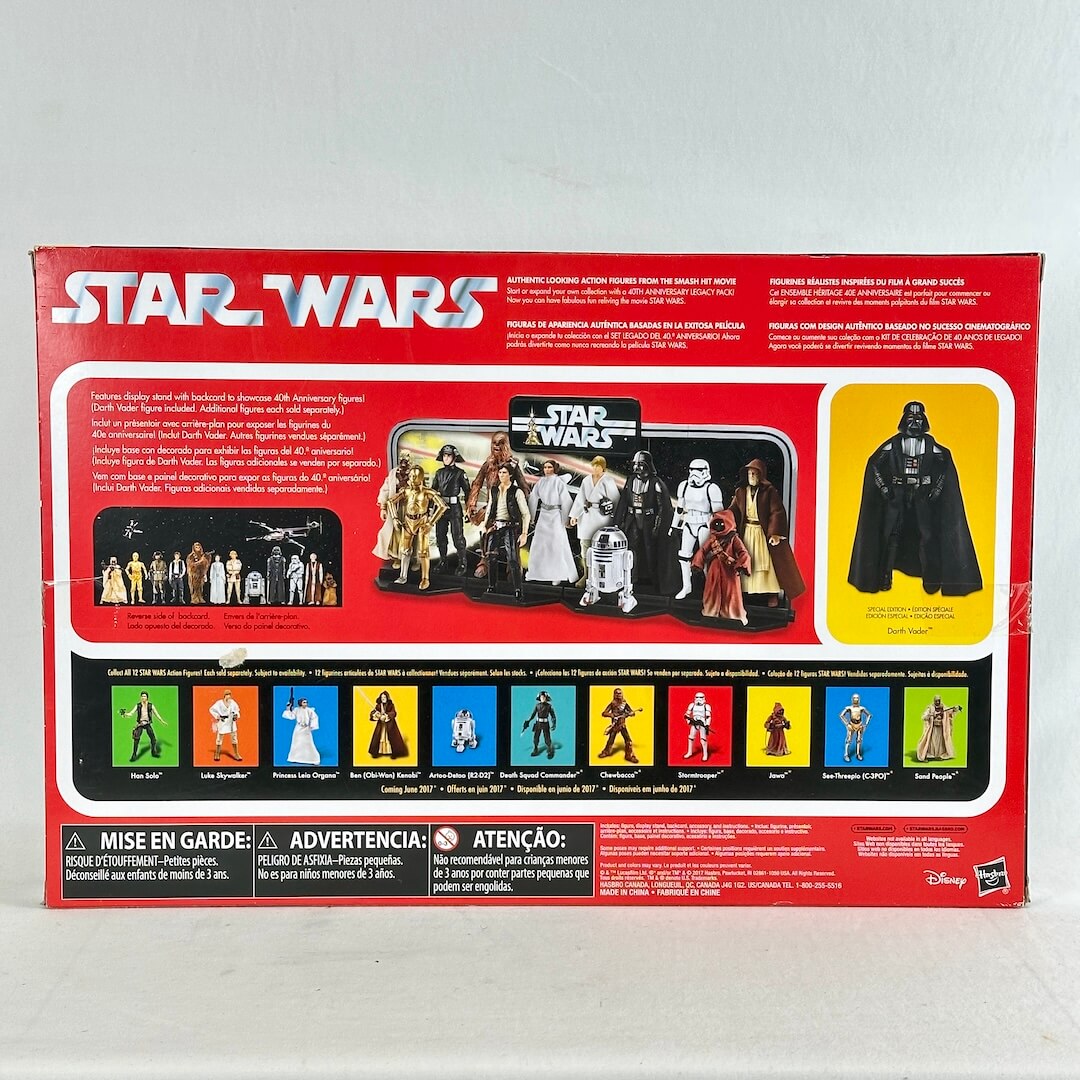 Star Wars action figure collection box back view showing character artwork, a Darth Vader figure.