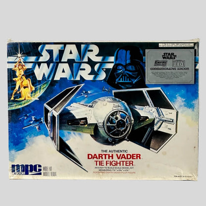 Darth Vader's TIE Fighter in flying scene depicted on box under STAR WARS logo & Vader's face by item sticker.