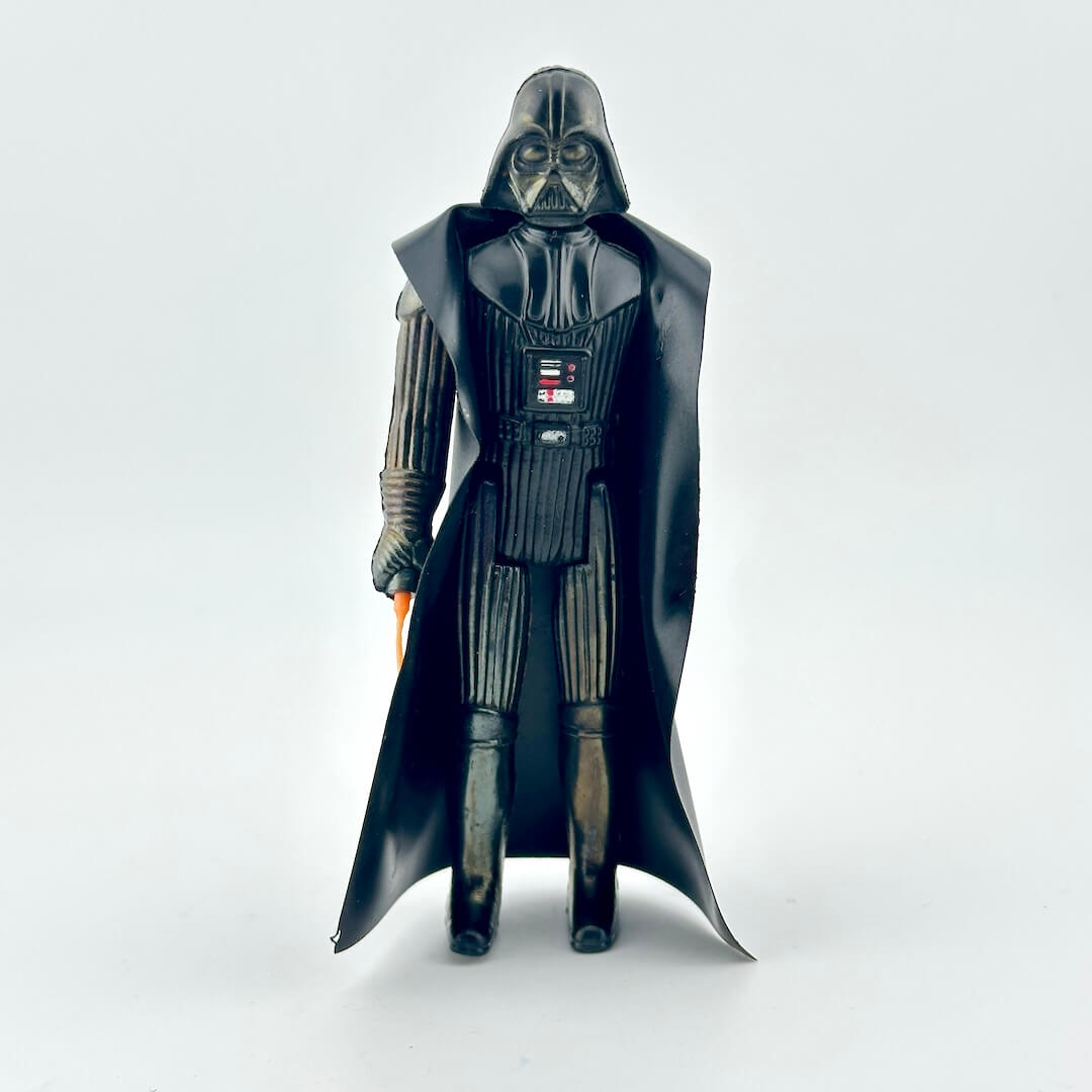 Darth Vader action figure from Star Wars on a white background