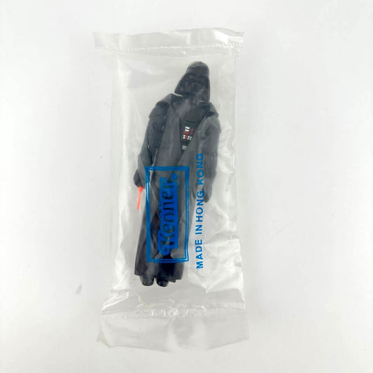 Darth Vader action figure in clear plastic bag with "Kenner" branding printed on bag, against white background.