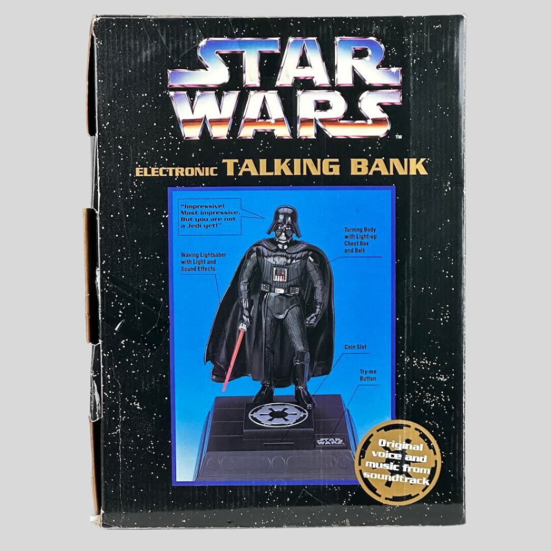 Star Wars electronic talking bank with Darth Vader figure on a white background