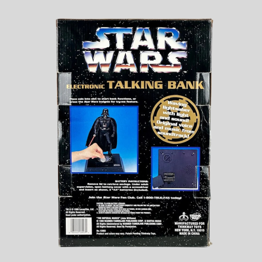 Star Wars electronic talking bank toy packaging on a gray background