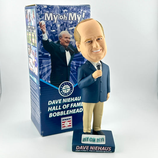 Bobblehead figure of a person in a suit with packaging labeled 'My oh My! Dave Niehaus Hall of Fame Bobblehead'.