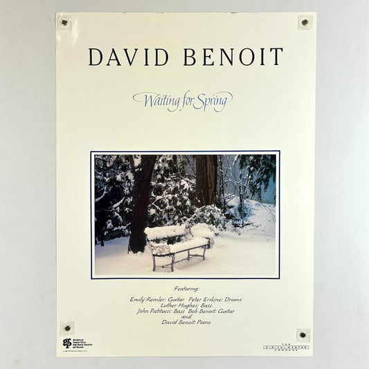Poster with central image of park bench under snow with text above and below describing artists. 