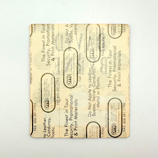 Backside of pass showing intact paper backing and mint condition. 
