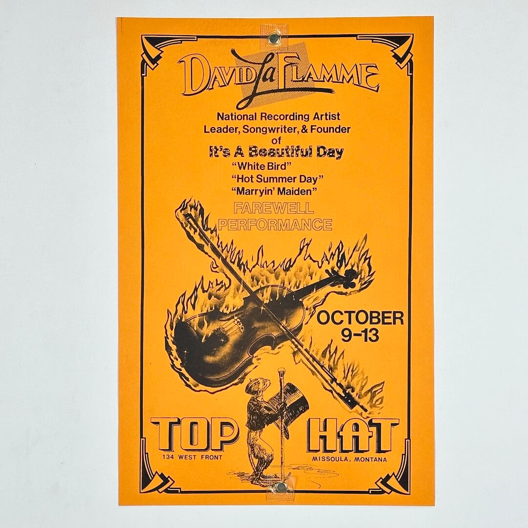 Orange poster with black print and illustrations for David La Flamme concert in Missoula, Montana. 
