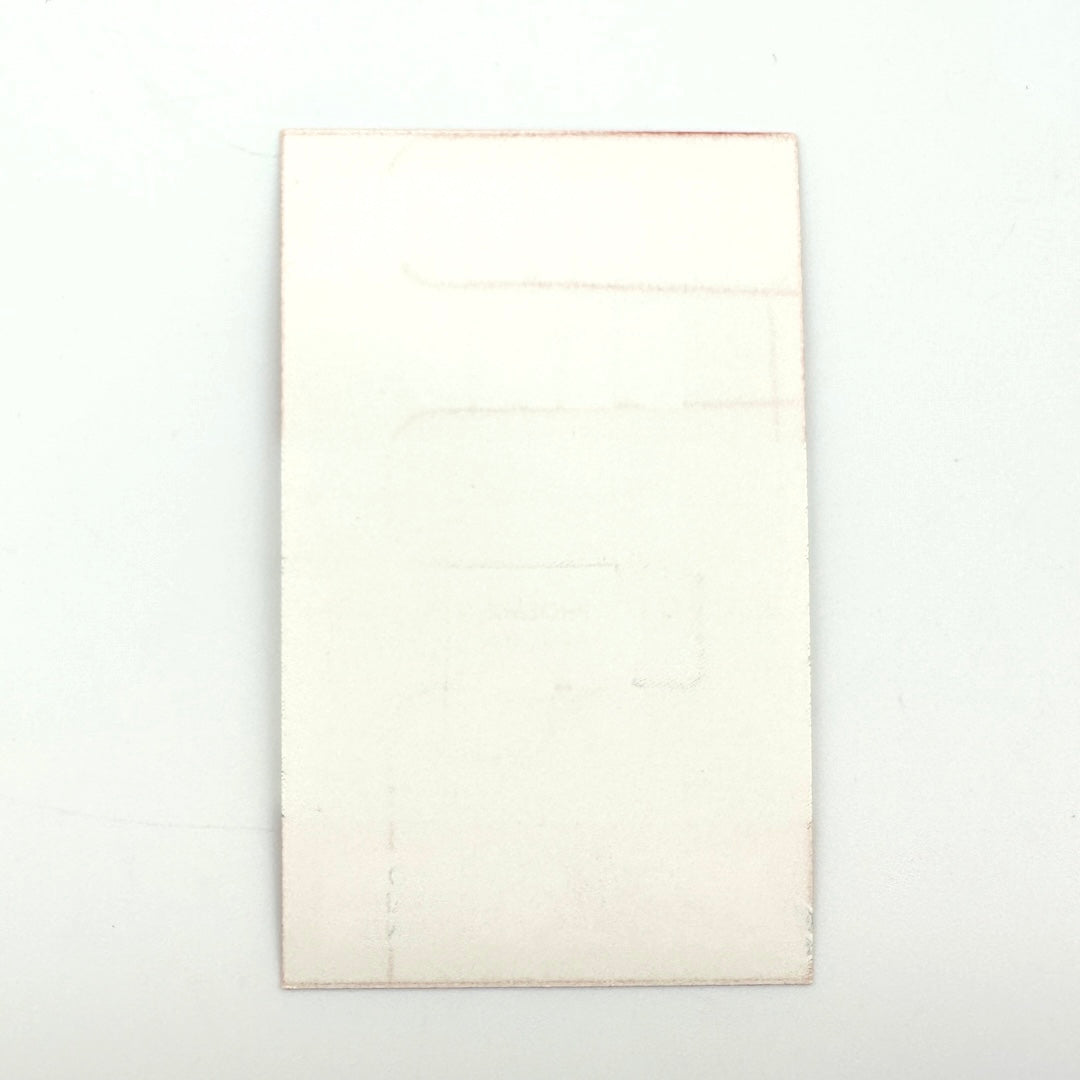 Backside of laminate showing mint condition. 