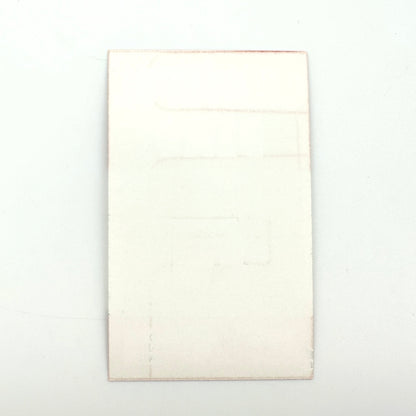 Backside of laminate showing mint condition. 