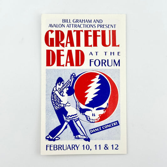 Backstage pass for Grateful Dead concert at LA forum with two people dancing next to a stealie. 