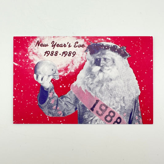 Pink laminate with "New Year's Eve, 1988-1989" with image of Father Time in black and white. 