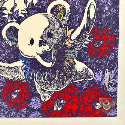 Bottom right corner of concert poster showing no damage to corner or edges. Artist signature in silver