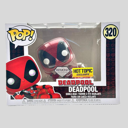 Deadpool figure in packaging with 'Pop!' branding and Hot Topic exclusivity label.