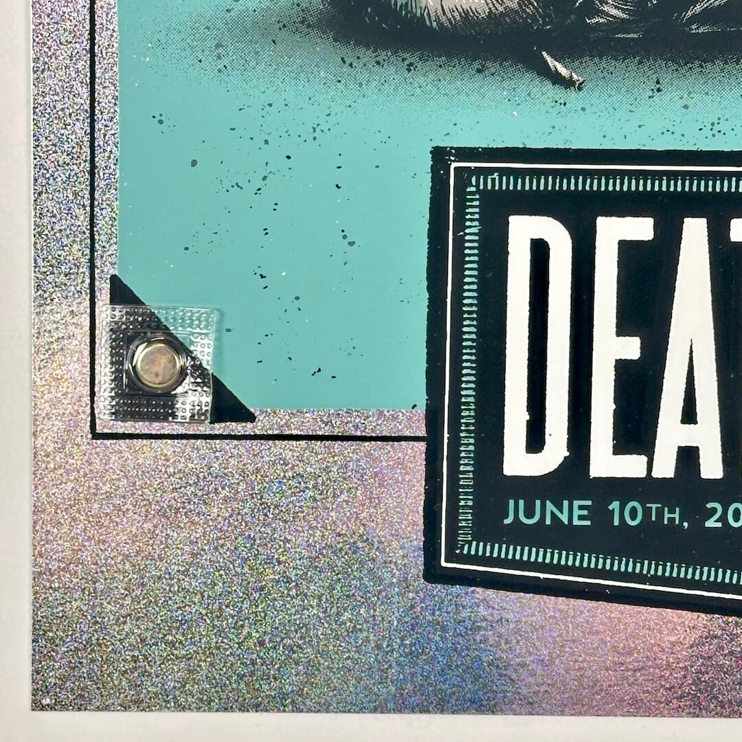 Bottom left corner of poster showing pin hole at very corner of poster, no other damage.