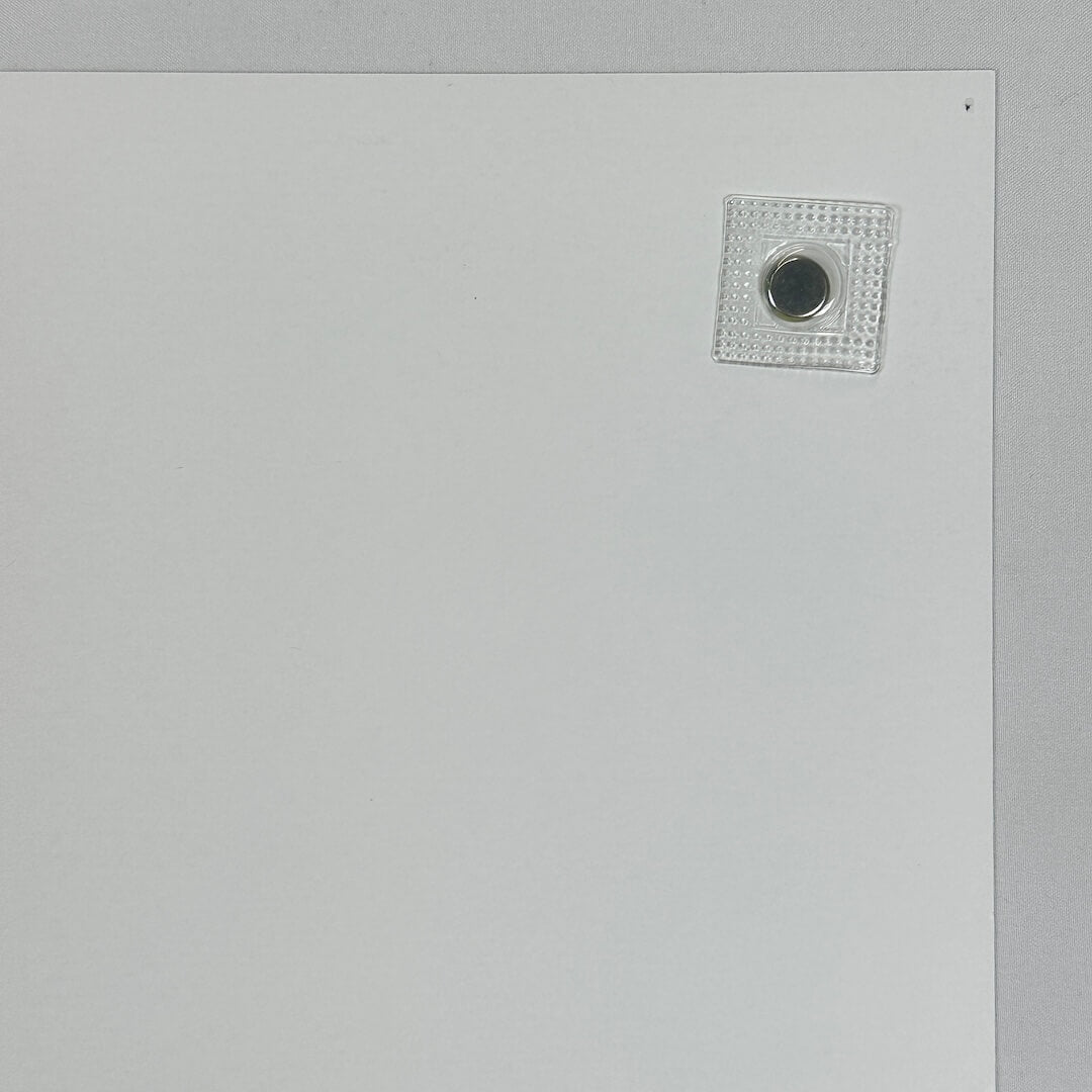 Top right corner of backside to show pin hole placement. 