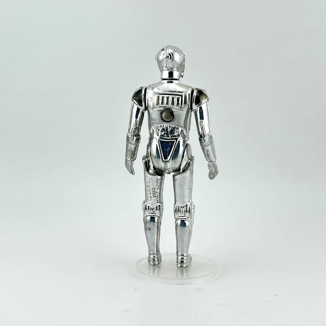 Silver robot figurine on a white background