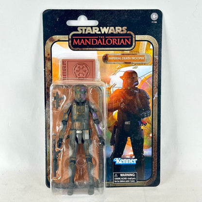 Star Wars action figure in original blister packaging showing figure in dark armor with accessories. 
