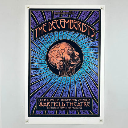 Multicolor poster for The Decemberists with human head in center with circulatory system visible. 