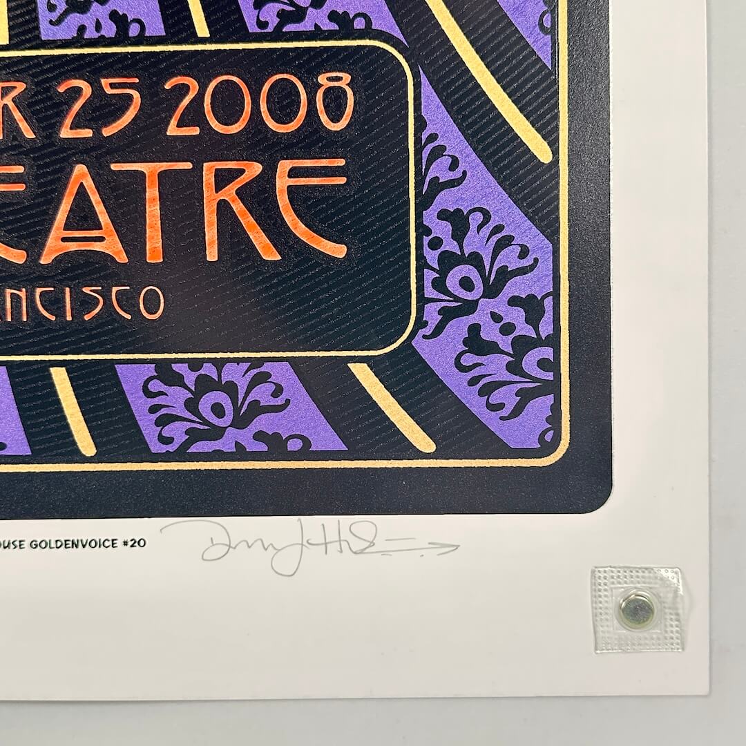 Bottom right corner of poster with no visible damage, and artist signature. 