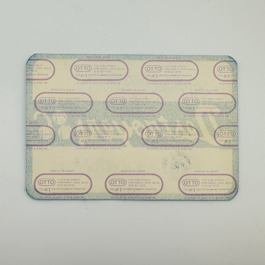 Backside of pass showing intact backing and mint condition. 