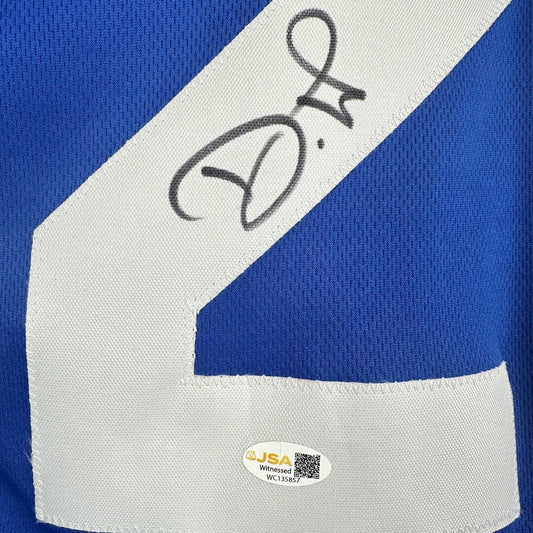 Blue and white sports jersey with a signature and JSA authentication label.