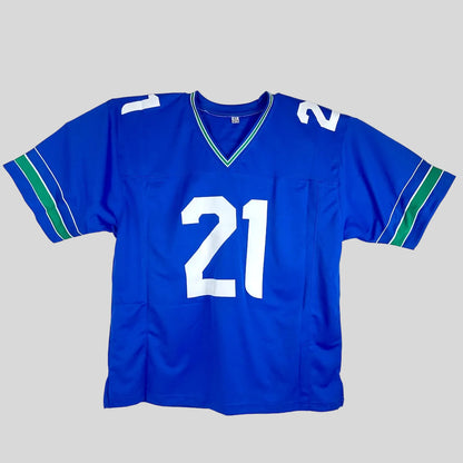 Blue sports jersey with number 21 on a white background