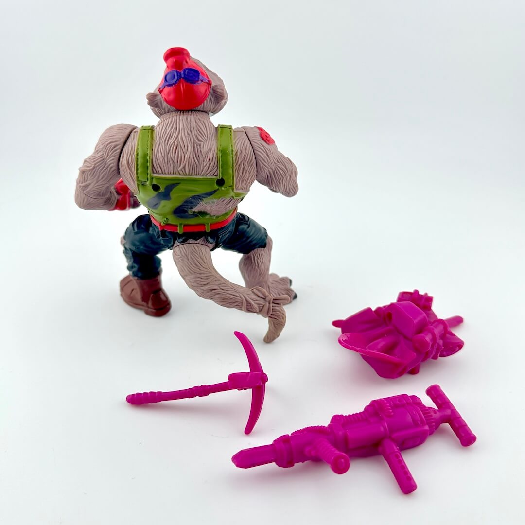 TMNT action figure with accessories against white background. 