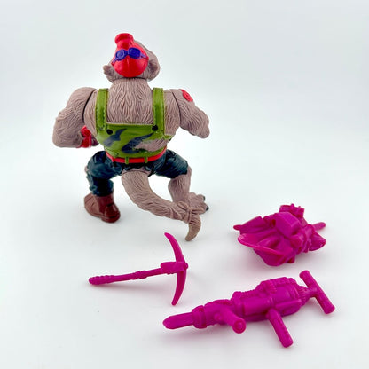 TMNT action figure with accessories against white background. 