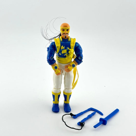 Toy figure in blue and yellow outfit with accessories on a white background