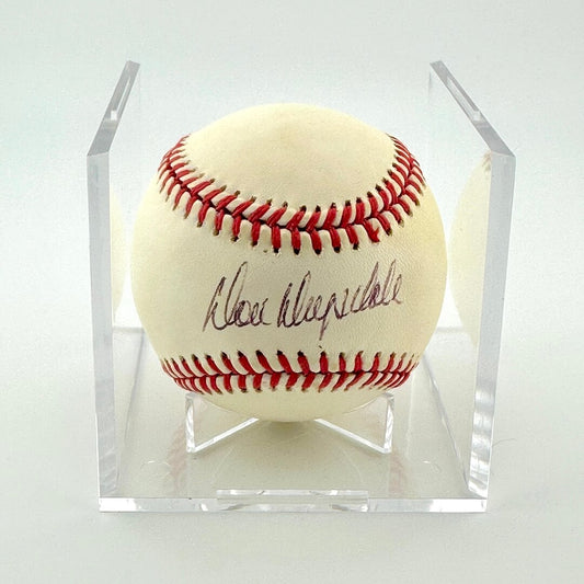 Baseball with autograph in a clear display case on a white background
