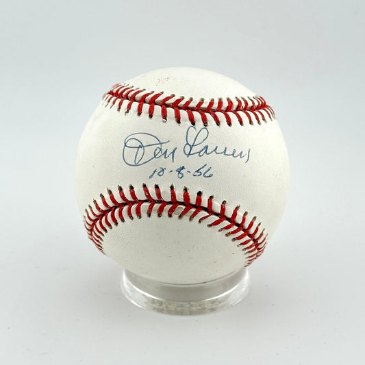 Baseball with autograph on a white background