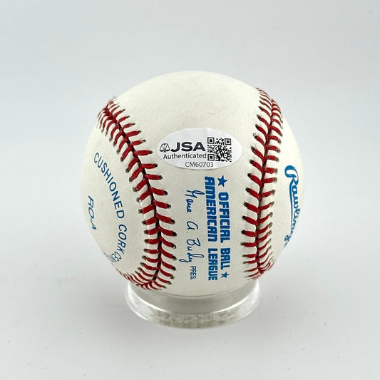 Baseball with JSA authentication sticker on white background. 
