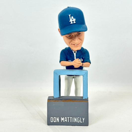 A bobblehead figurine of baseball player Don Mattingly in a blue Los Angeles Dodgers uniform and cap.