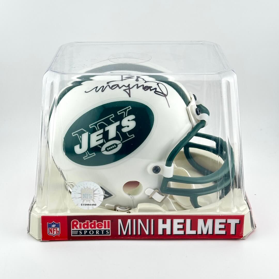 Miniature football helmet with 'Jets' logo in clear packaging, featuring Riddell Sports branding.