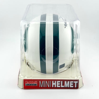 Riddell mini football helmet in clear packaging on a white background