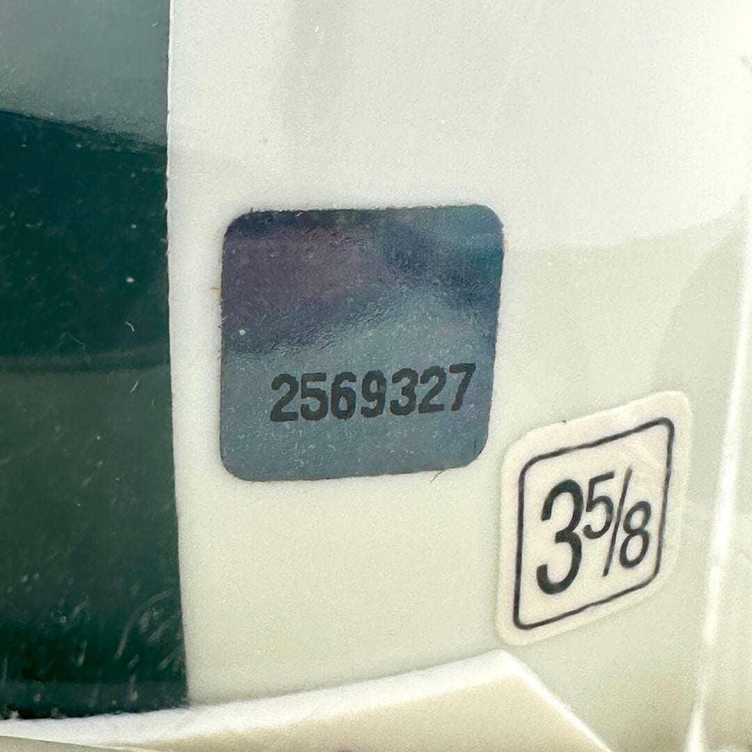 Close-up of authentication sticker so number is visible. 