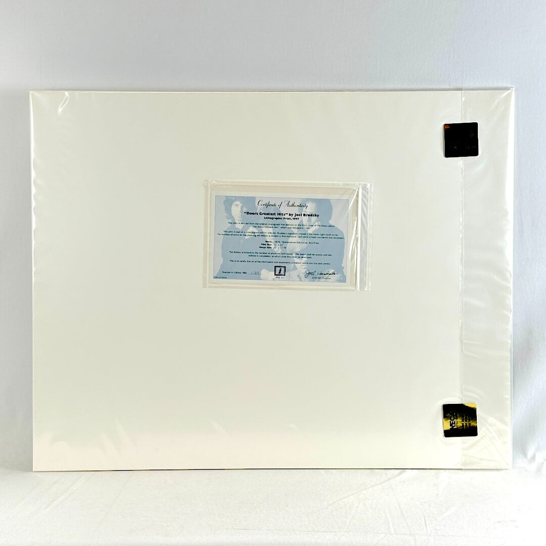 Backside of print with certificate of authenticity and gold sticker seals. 