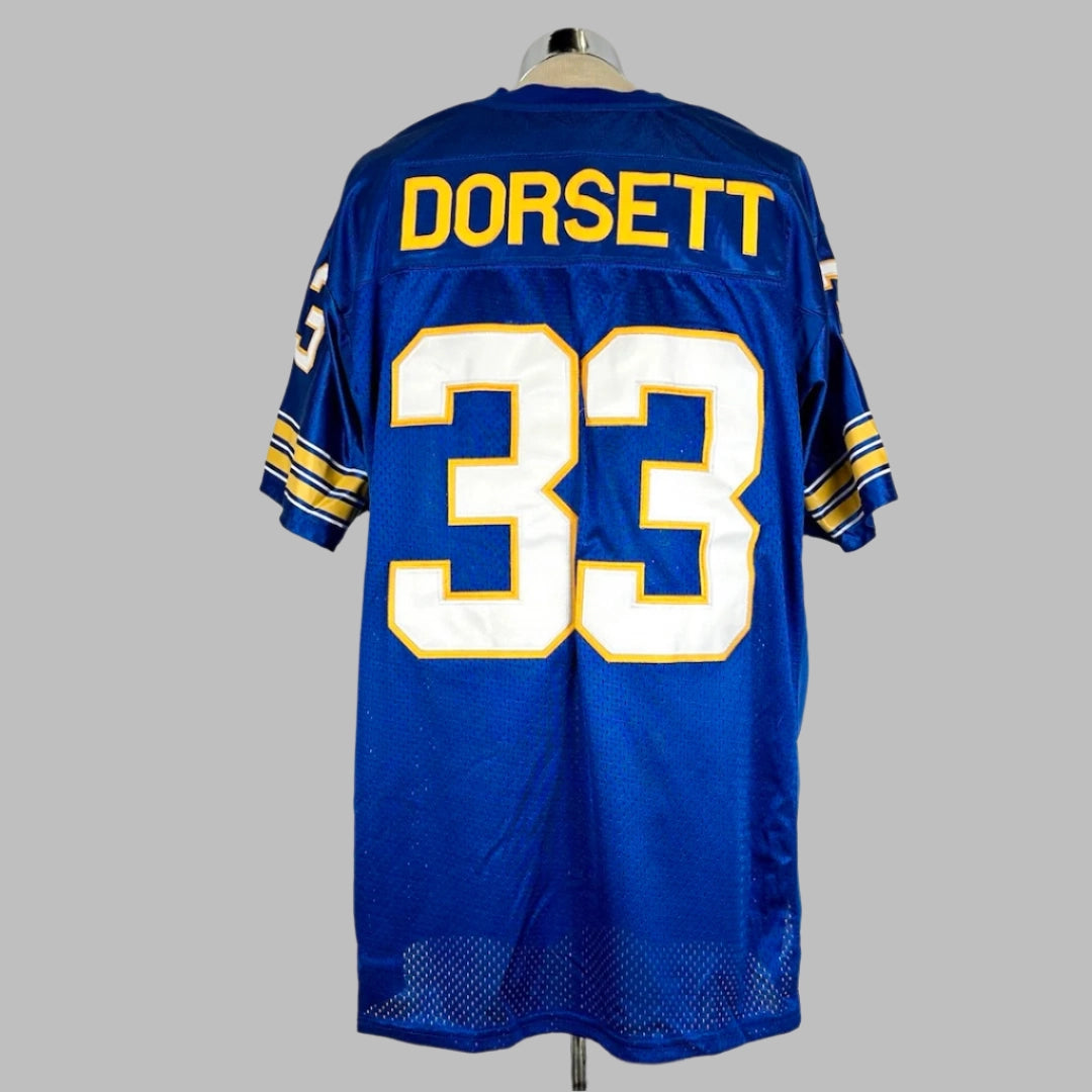 Back of blue jersey with white 33 outlined in yellow on chest. DORSETT in yellow on nameplate. Yellow/white striped sleeves. 