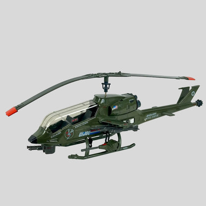 An olive green military-style helicopter model with a clear canopy, orange-tipped rotor blades, and white printed markings.