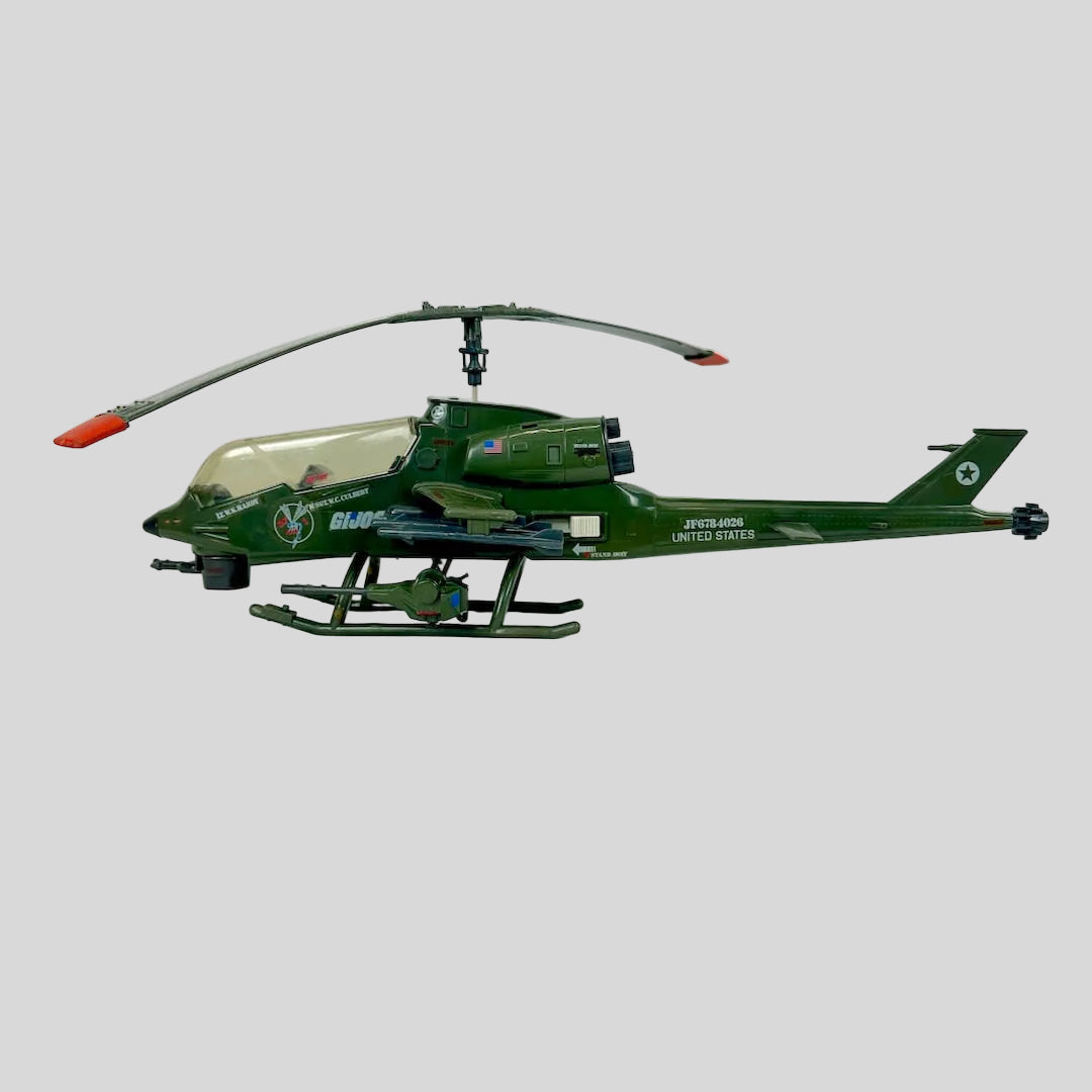 Green helicopter model on a white background