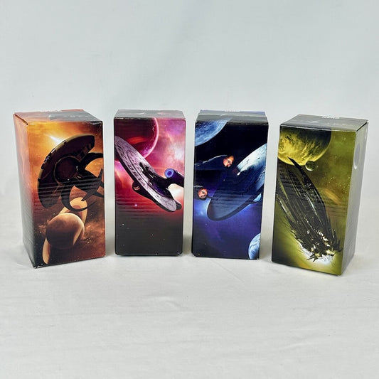 Four colorful boxes with spaceship graphics against white background.