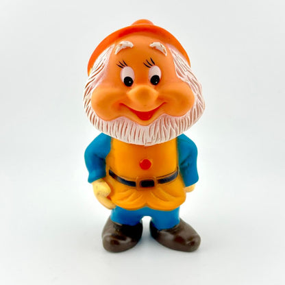 Toy figure of a dwarf with a white background