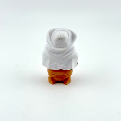Backside of action figure with next to no wear and COO information on back.