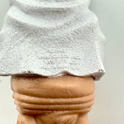 Close-up of COO and copyright information on back of figure. 