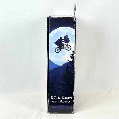 Cardboard box with E.T. and Elliott with bicycle design on a white background