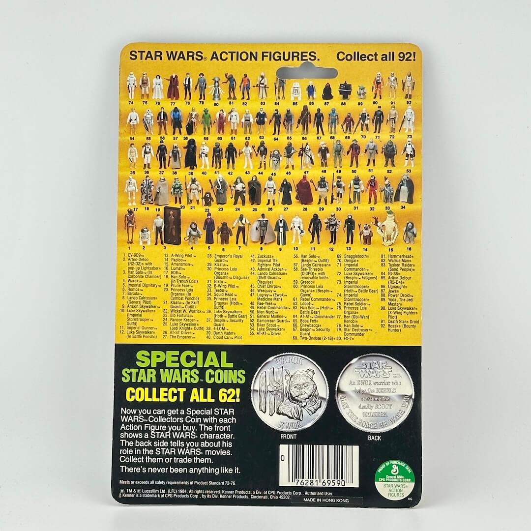 Star Wars action figures packaging with character list and coins on a yellow and black background